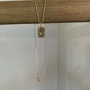 -14k yellow gold necklace and 18k gold pendant